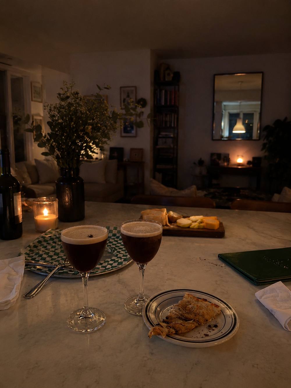Two espresso martinis on marble